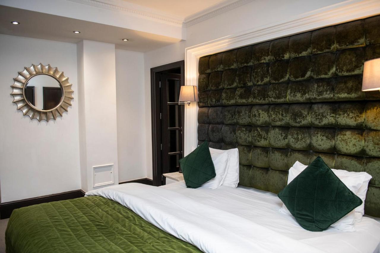 더 익스비셔니스트 호텔 바이 더키컬렉션 런던 외부 사진 A bedroom at the hotel