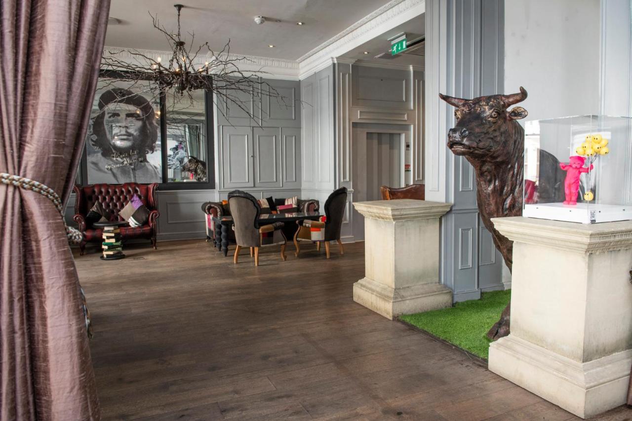 더 익스비셔니스트 호텔 바이 더키컬렉션 런던 외부 사진 The interior of the hotel